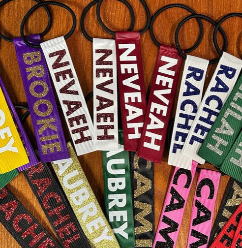 TROJANS POM POM TAGS