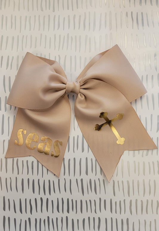 Tan Bow  bow with cross and seas.