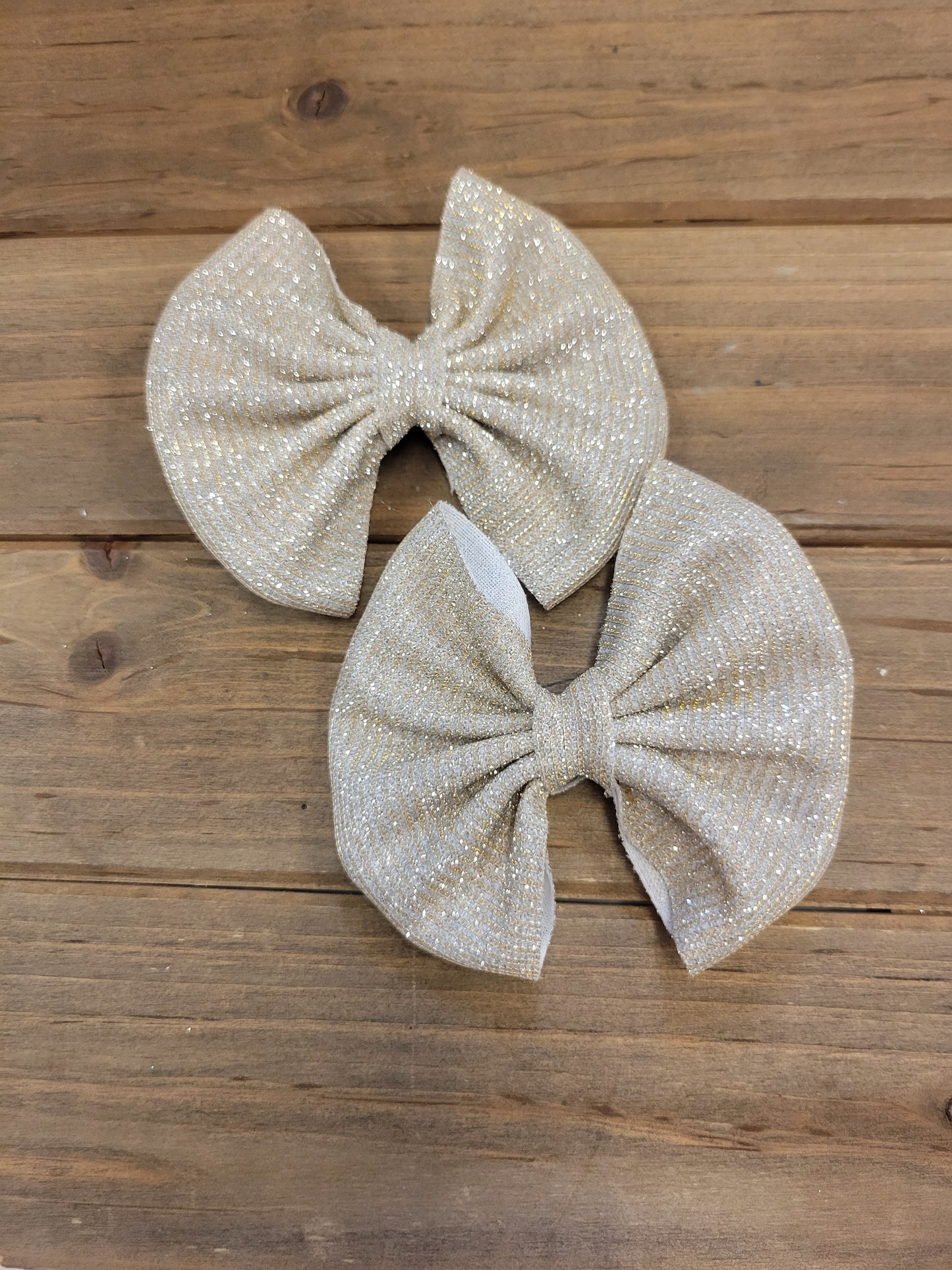 metallic gold  pair of bows 3inch ea.